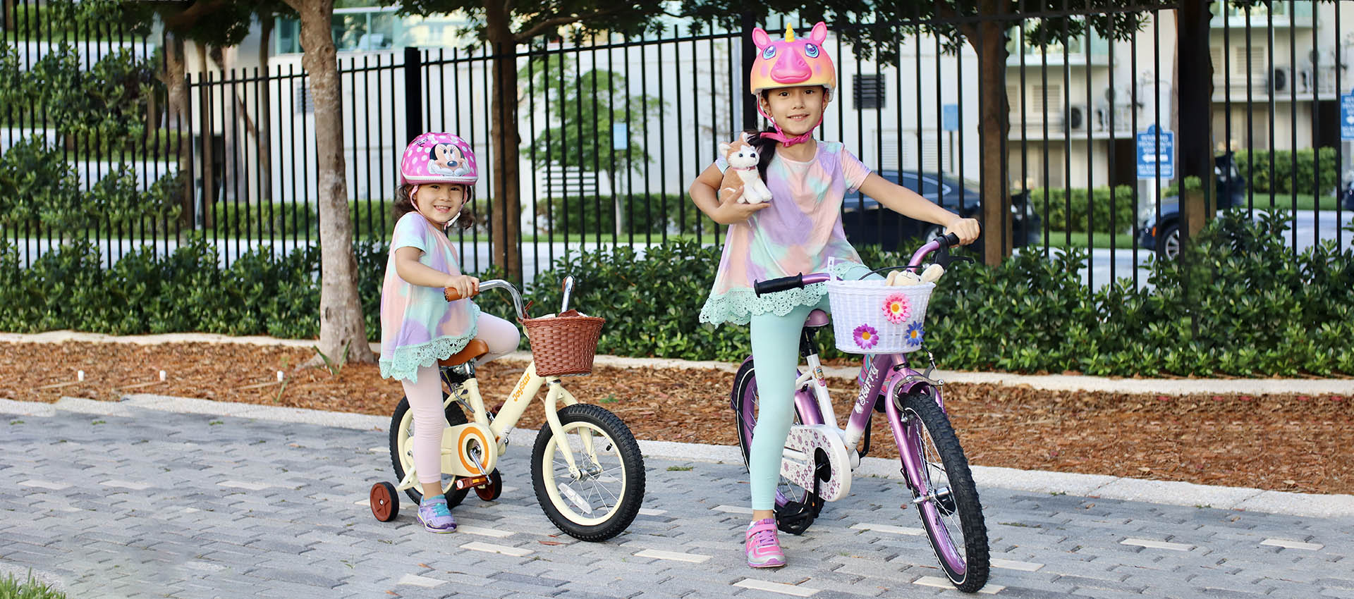 two girls riding joystar kids bike